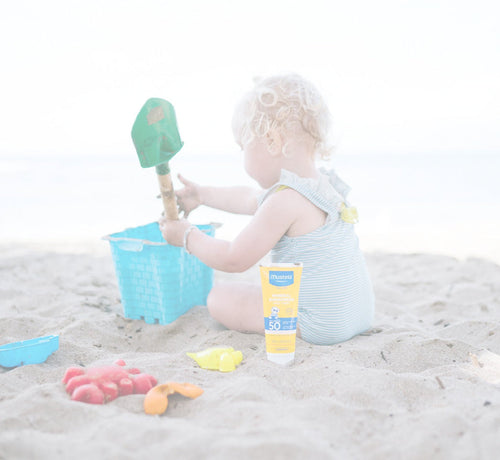 baby sunscreen at the beach - Mustela USA - 1