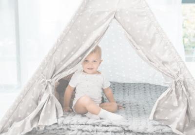 Baby sitting in a fort - Mustela USA - 1