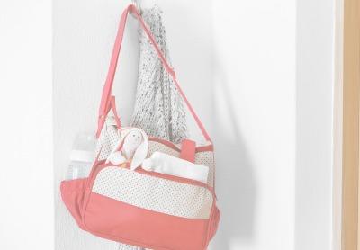 Bag filled with all diaper bag essentials - Mustela USA - 1