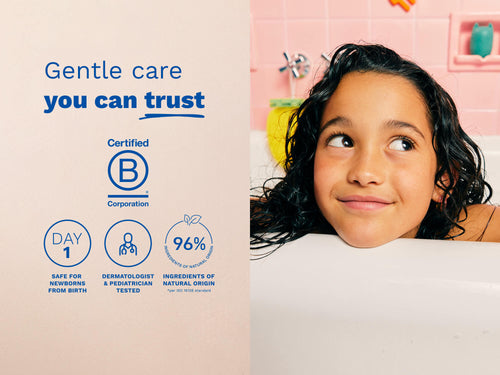 Child with wet curly hair resting on the edge of a bathtub, alongside icons and text about gentle, trustworthy care and natural ingredients. - Mustela USA - 4