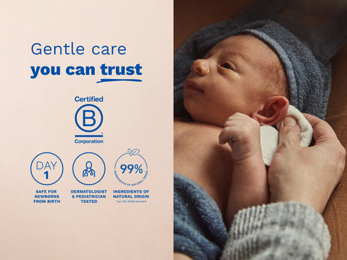 Newborn wrapped in a blue towel being gently held, with blue text and icons on the left side. - Mustela USA - 5