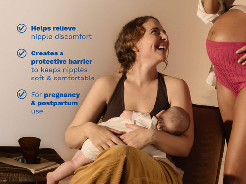 Mustela USA | A laughing woman sits in a chair breastfeeding her newborn baby, with another person standing nearby. Three checkmarked claims appear on the left: helps relieve nipple discomfort; creates a protective barrier to keep nipples soft and comfortable; suitable for pregnancy and postpartum use. - Mustela USA - 2