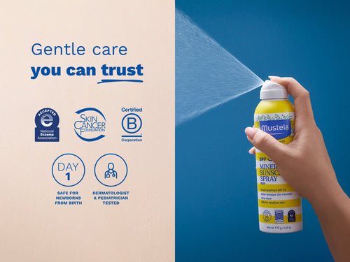 Mustela USA | Hand spraying Mustela SPF 50 Mineral Sunscreen Spray against a blue background. Text: Gentle care you can trust. Certified by National Eczema Association, Skin Cancer Foundation, and B Corporation. Safe for newborns from birth, dermatologist and pediatrician tested - Mustela USA - 4