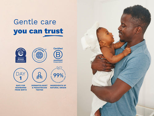 Father holding baby next to eczema and safety certification icons. - Mustela USA - 5