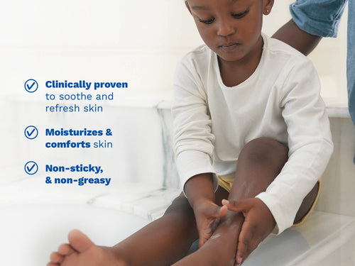 Mustela USA | Child sitting on a bathroom counter applying gel to their leg. - Mustela USA - 4