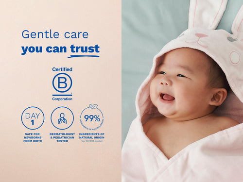 Mustela USA | Smiling baby wrapped in a pink bunny towel next to gentle care certifications. - Mustela USA - 5
