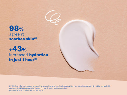 Cream texture swipe on a beige background with blue text indicating product benefits - Mustela USA - 2