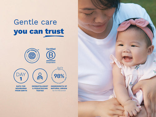 Mother holding smiling baby next to product safety and certification icons. - Mustela USA - 3