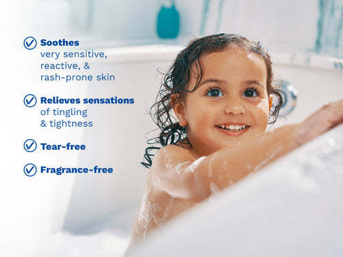 Smiling child in a bubble bath with product benefits listed. - Mustela USA - 2
