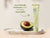 Multi-purpose Balm with 3 Avocado Extracts showing eco-friendly aluminum tube and half avocado