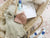 Image of basket with hat, journal, clothes and Newborn Arrival Gift Set products